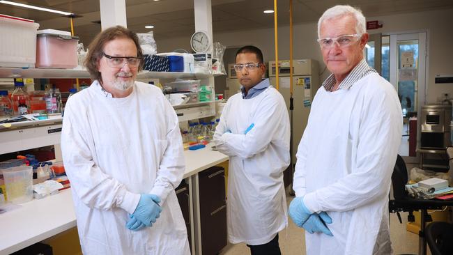 Heart patient Aaran Creece with cardiologist associate professor Sean Lal and surgeon professor Paul Bannon in a laboratory in the Charles Perkins Centre at the University of Sydney. Picture: John Feder