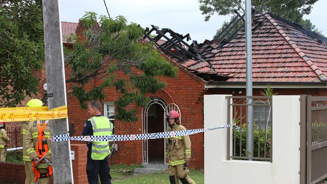 The roof of the home on Myrna Rd, Strathfield sustained significant damage. Picture Damian Shaw