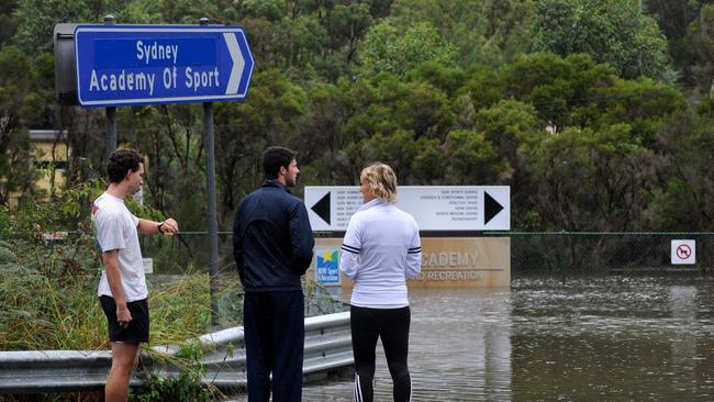 Flooding on the Wakehurst Parkway near the Sydney Academy of Sport at Narrabeen. Picture: Manly Daily