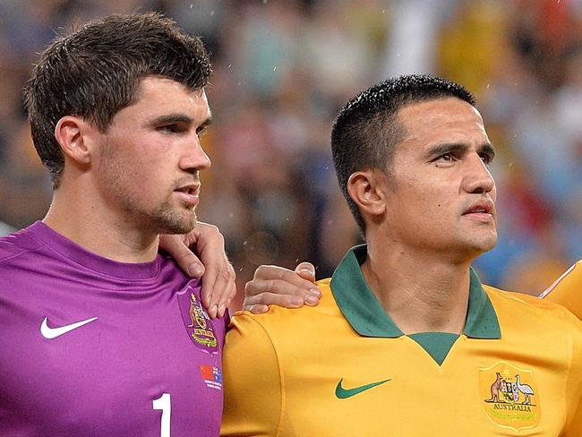 BRISBANE, AUSTRALIA - JANUARY 22: Australian players embrace for the national anthem before the 2015 Asian Cup match between China PR and the Australian Socceroos at Suncorp Stadium on January 22, 2015 in Brisbane, Australia. (Photo by Bradley Kanaris/Getty Images)