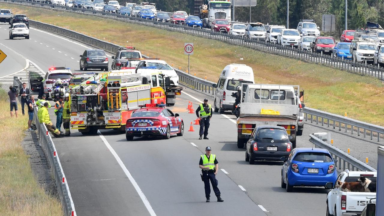 Police apprehended a man and woman at gunpoint after they led emergency services on a car chase from Hervey Bay. The alleged stolen car ended up on its roof and the occupants were taken into custody. Photo: John McCutcheon / Sunshine Coast Daily