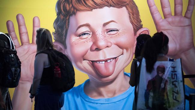 MAD’s Alfred E. Neuman character dominates a wall at a Comic-Con festival in San Diego, California. Picture: AP