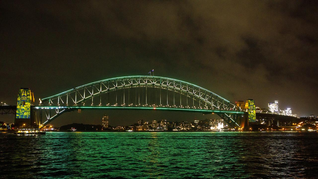 The Sydney Harbour Bridge is lit up to celebrate Australia's successful RWC bids. Picture: Karen Watson for Rugby AU
