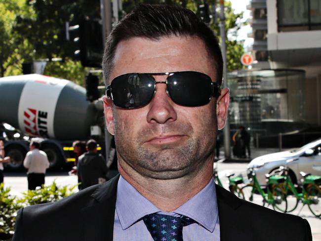 Patrick Nealon (sun glasses) entering the Downing centre court in Sydney on the 23rd of October 2019. Patrick Nealon alleged drink driver who caused the death of a pedestrian. Photographer: Adam Yip