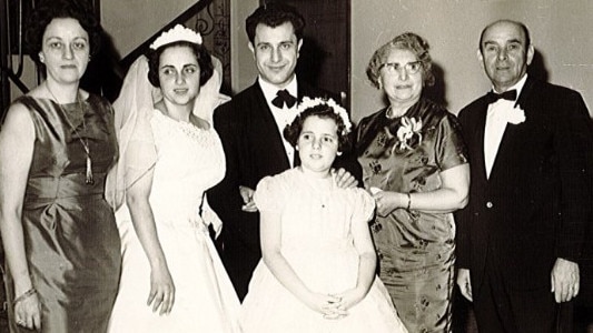 Ernie Friedlander on his wedding day with his mother, Amelia Friedlander, and parents-in-law. Picture: Supplied