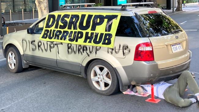 Disrupt Burrup Hub protesters blocked off a busy Perth street on Monday morning. Picture: Disrupt Burrup Hub
