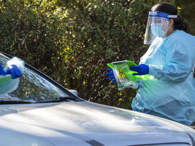 COVID-19 testing at a drive-through fever clinic in Ipswich. Picture: Glenn Hunt