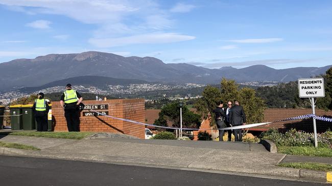 Police on the scene at a unit complex on Carbeen St, Mornington where a man was found dead at 2.50am this morning.