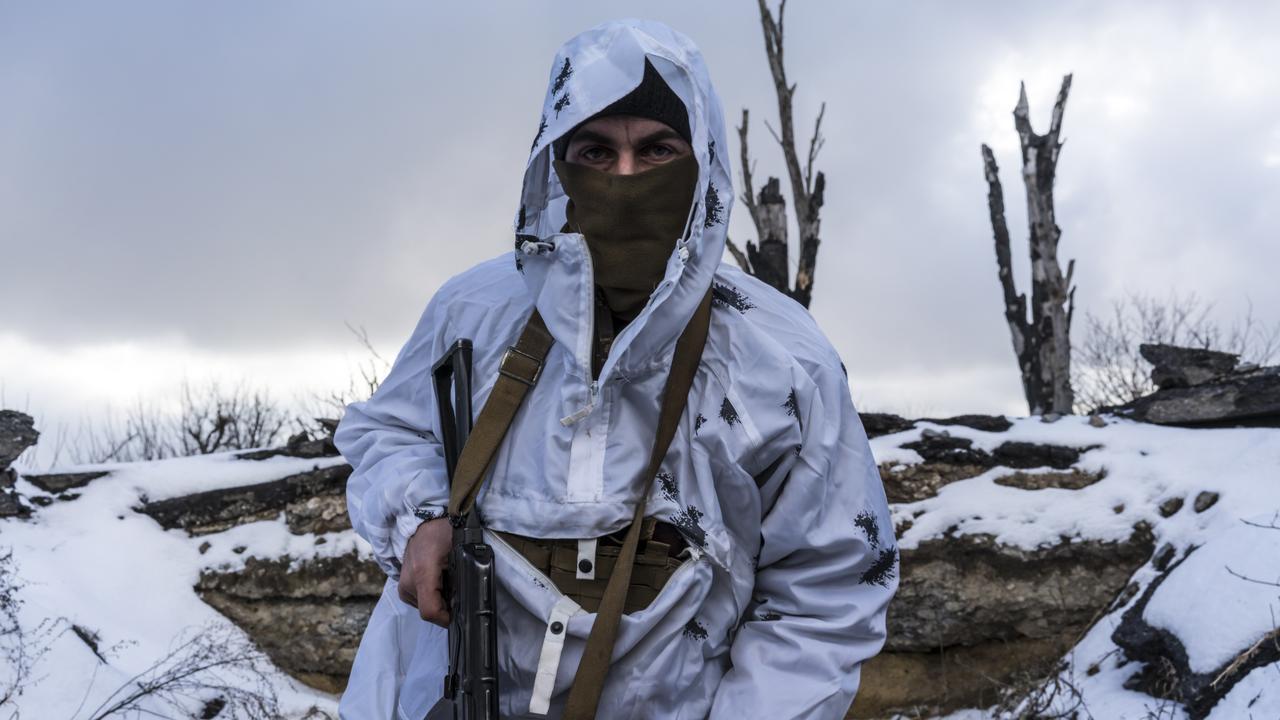 A Ukrainian soldier on the front line on January 18, 2022 in Pisky, Ukraine. Picture: Brendan Hoffman/Getty Images