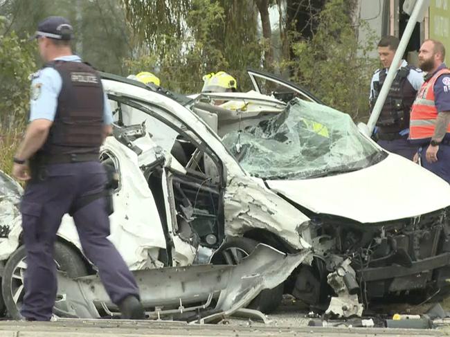 The car which smashed into a pole and the fence of a pub at Leppington after being involved in a police chase. Picture: TNV.