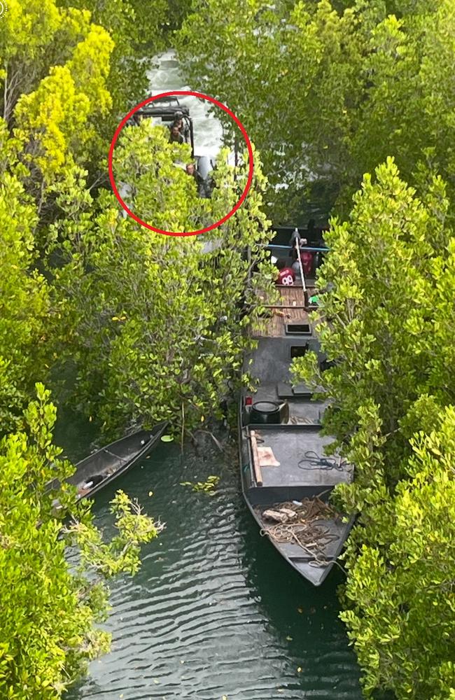 RAN personnel delved into the dense vegetation to catch the third boat. Picture: Supplied.