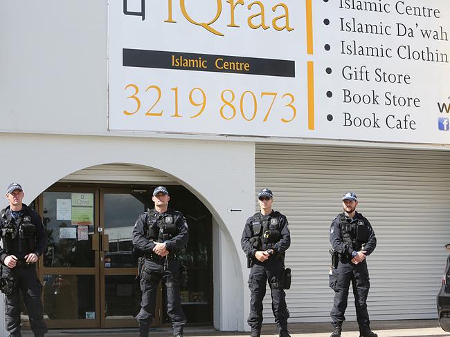 Police outside the iQraa Islamic book store, which was raided yesterday. Photo: Annette Dew