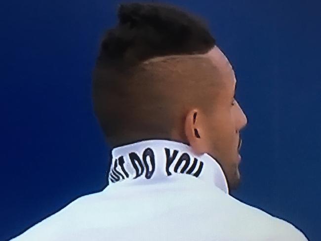 Nick Kyrgios' collar hid a statement for all his critics. Picture: Supplied