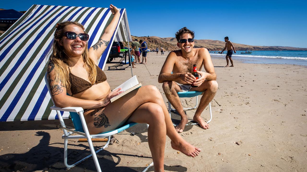 Bella McRae and Remy Matters starting the year right on Sellicks Beach. Picture: Tom Huntley