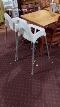 Aussie bloke films mess under highchairs in restaurant