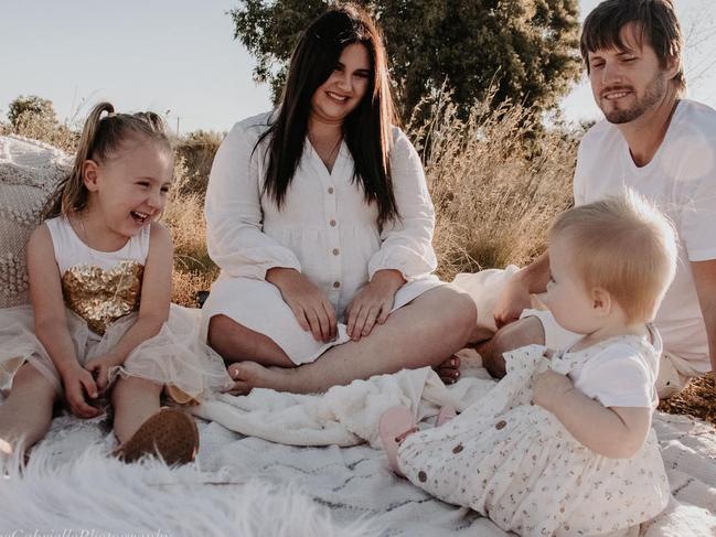 Cleo with mum Ellie Smith her sister and partner Jake Gliddon. Picture: Facebook