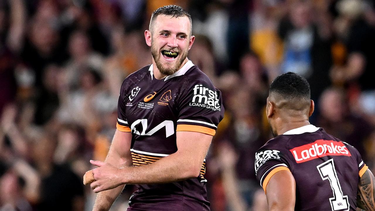 BRISBANE, AUSTRALIA - MARCH 11: Kurt Capewell of the Broncos celebrates after kicking a field goal during the round one NRL match between the Brisbane Broncos and the South Sydney Rabbitohs at Suncorp Stadium, on March 11, 2022, in Brisbane, Australia. (Photo by Bradley Kanaris/Getty Images)