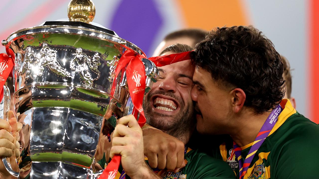 James Tedesco of Australia lifts the Rugby League World Cup trophy