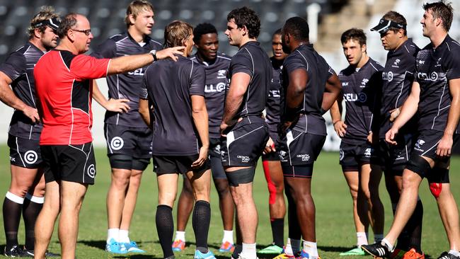 Jake White calls the shots during a Sharks training session.