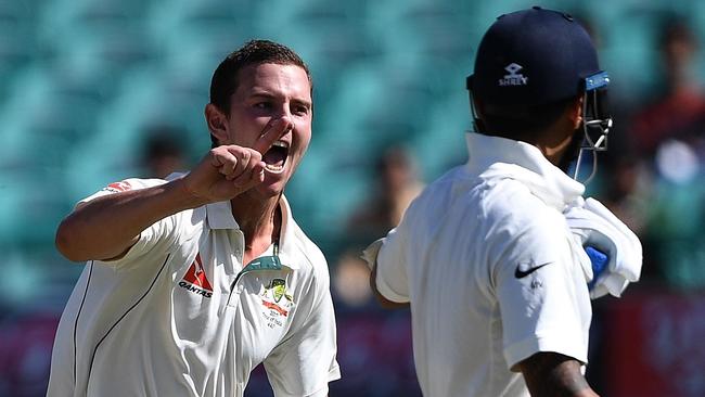 Josh Hazlewood gives Murali Vijay a send-off in the fourth and final Test.