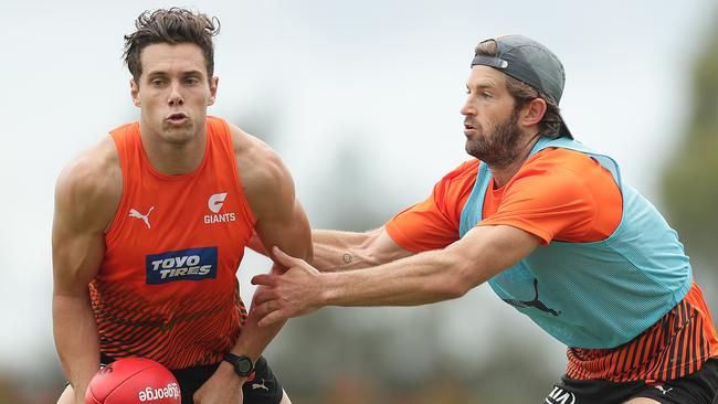 Josh Kelly and Callan Ward do battle at training. Picture: Mark Metcalfe/Getty Images