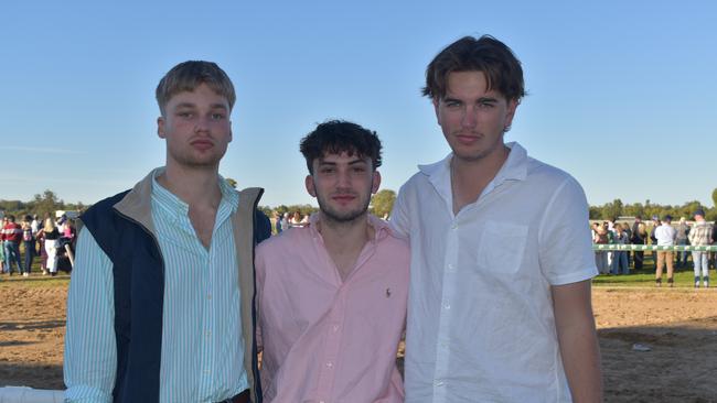 Lachlan, Braden and Christian at the Roma Rugby Races at Bassett Park on Saturday June 24, 2023. Picture: Chloe Cufflin.