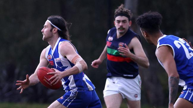 Dale Powell carries the ball forward against the Northern Saints. Photo: Hamish Blair