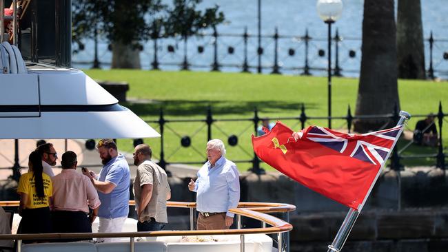 People are pictured with Clive Palmer aboard his 40 million dollar super yacht, Australia, on Sydney Harbour. Picture: NCA NewsWire / Dylan Coker