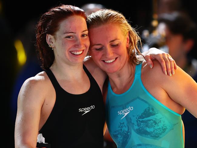 BRISBANE, AUSTRALIA - JUNE 12: Ariarne Titmus (R) of Queensland celebrates with Mollie O'Callaghan (L) of Queensland after winning the Womenâs 200m Freestyle Final in a new world record time of 1:52.23 during the 2024 Australian Swimming Trials at Brisbane Aquatic Centre on June 12, 2024 in Brisbane, Australia. (Photo by Chris Hyde/Getty Images)