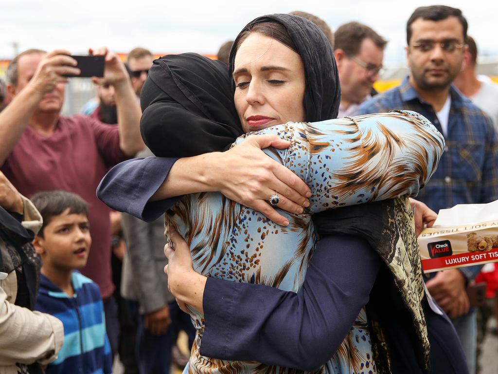 Prime Minister Jacinda Ardern hugs a woman at the Kilbirnie Mosque. Picture: Getty Images