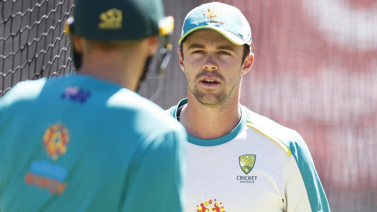 MELBOURNE, AUSTRALIA - DECEMBER 24: Travis Head of Australia (R) speaks with Scott Boland of Australia during an Australian Ashes squad nets session at Melbourne Cricket Ground on December 24, 2021 in Melbourne, Australia. (Photo by Daniel Pockett/Getty Images)