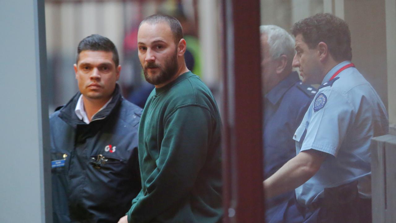 Christopher Tippens is loaded into a prison van at the Melbourne Supreme Court in 2015. Picture: AAP / David Crosling