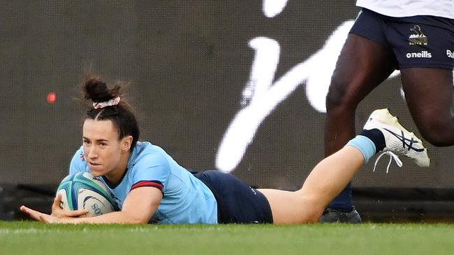 Maya Stewart scoring one of her two tries against the ACT Brumbies.