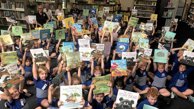 BOOK WORMS: Frenchville students receive books from Rotary clubs. Picture: contributed
