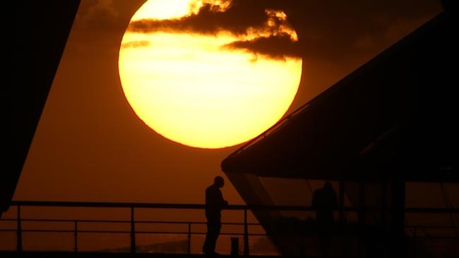 Sun rise in Sydney ahead of the forcasted heatwave. Picture: John Grainger