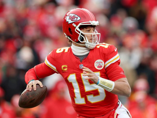 KANSAS CITY, MISSOURI - JANUARY 18: Patrick Mahomes #15 of the Kansas City Chiefs looks to pass against the Houston Texans during the first quarter in the AFC Divisional Playoff at GEHA Field at Arrowhead Stadium on January 18, 2025 in Kansas City, Missouri. (Photo by Jamie Squire/Getty Images)