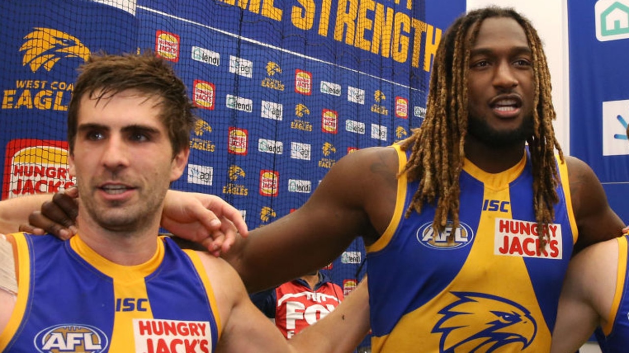 PERTH, AUSTRALIA - JULY 06: Andrew Gaff, Nic Naitanui and Jackson Nelson of the Eagles sing the club song after winning the round 16 AFL match between the Fremantle Dockers and the West Coast Eagles at Optus Stadium on July 06, 2019 in Perth, Australia. (Photo by Paul Kane/Getty Images)