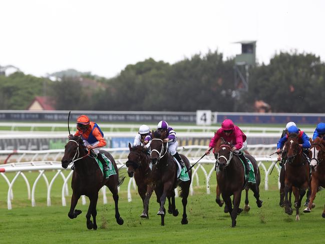 SYDNEY, AUSTRALIA - MARCH 02: Nash Rawiller riding Think It Over  wins Race 7 Verry Elleegant Stakes during TAB Verry Elleegant Stakes Day - Sydney Racing at Royal Randwick Racecourse on March 02, 2024 in Sydney, Australia. (Photo by Jeremy Ng/Getty Images)