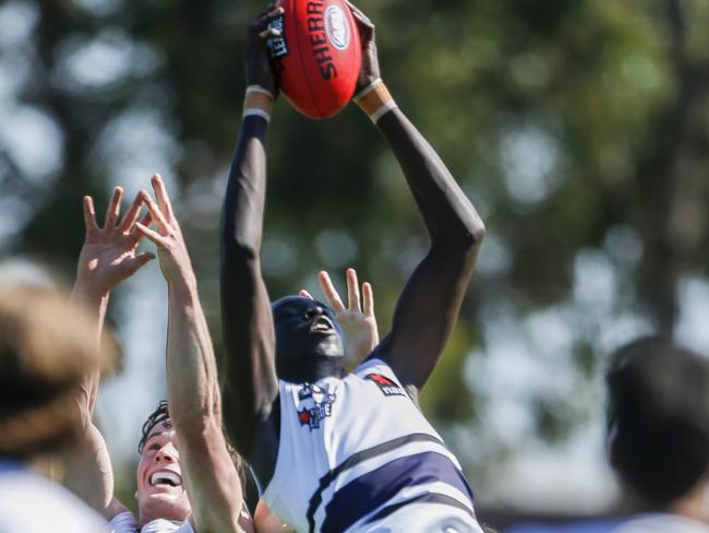 Dominic Akuei takes a mark in defence for Northern Knights. Picture: Valeriu Campan