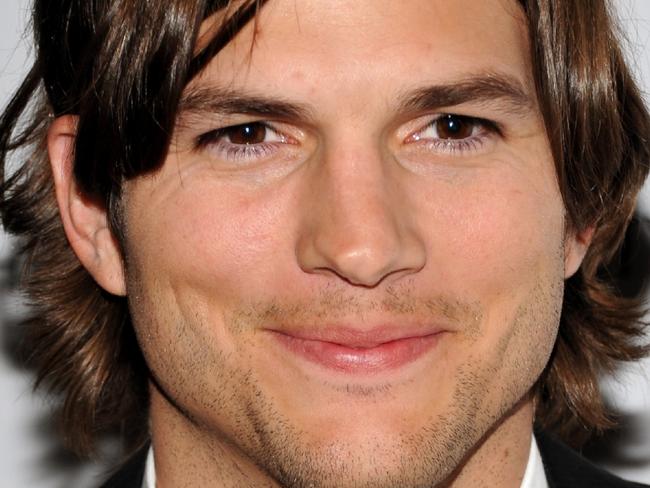 20/01/2011 WIRE: FILE - In this Jan. 20, 2011 file photo, actor Ashton Kutcher attends a special screening of "No Strings Attached" in New York. Kutcher is giving his Twitter followers a clue that he may be joining "Two and a Half Men" � or he's punking them. A tweet Wednesday came amid reports that he's nearing a deal to replace the fired Charlie Sheen on TV's top-rated comedy. (AP Photo/Evan Agostini, File)