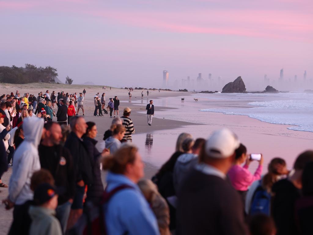 Crowds take part in the ANZAC dawn service on April 25, 2024 in Currumbin, Australia. (Photo by Chris Hyde/Getty Images)