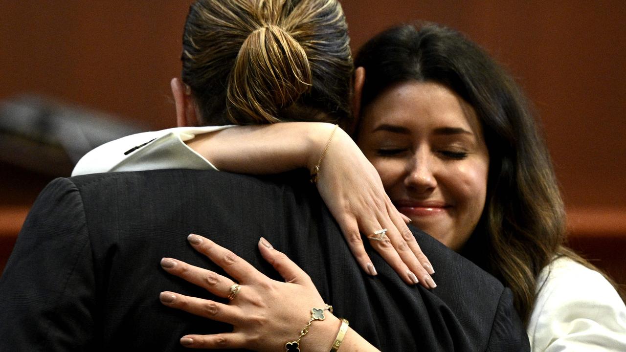 Another hug between Vasquez and Depp. Picture: AFP