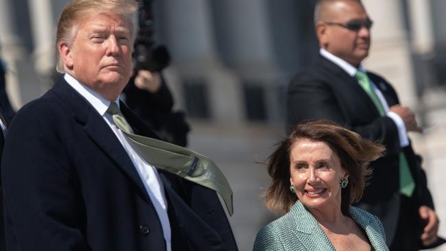 Donald Trump with Speaker of the House Nancy Pelosi. Picture: AFP.