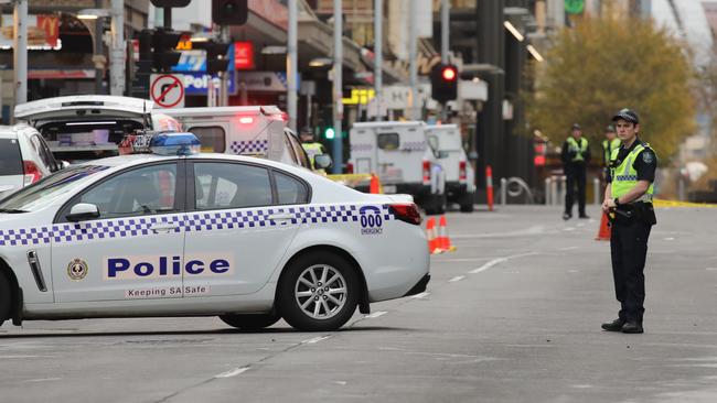 Police and on Hindley St, where a man was assaulted near Bank St about 4am. Picture: AAP / Dean Martin