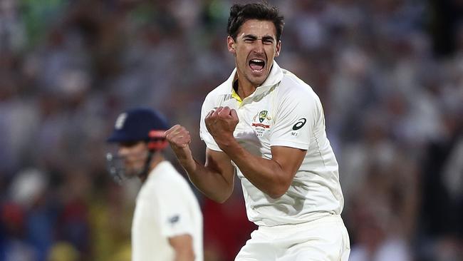 Mitchell Starc celebrates the wicket of Mark Stoneman.