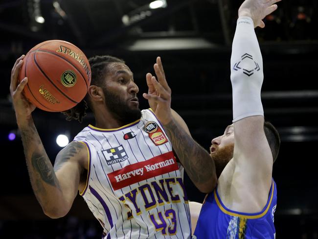 Jonah Bolden of the Kings is challenged by Aron Baynes of the Bullets during the 2023 NBL Blitz match between Sydney Kings and Brisbane Bullets at Gold Coast Convention and Exhibition Centre. Photo: Russell Freeman/Getty Images for NBL.