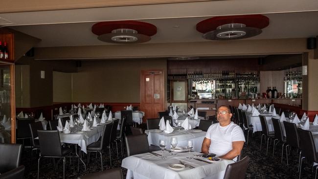 Restaurant owner Nalin Jayaweera sits in the dark at his restaurant, Shavans Pinewood, in Mt Waverley. Picture: Asanka Ratnayake/Getty Images