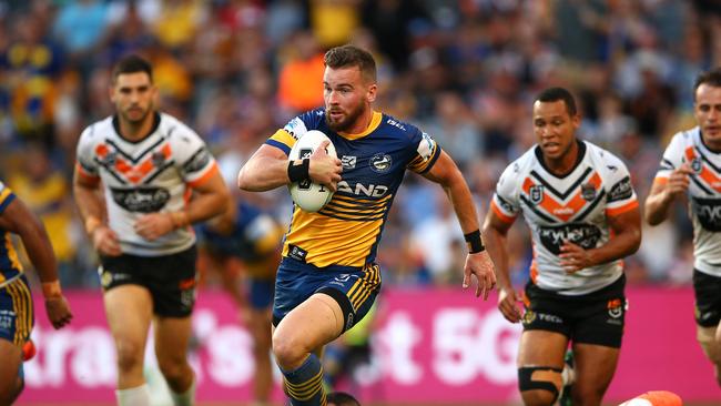 SYDNEY, AUSTRALIA - APRIL 22: Clint Gutherson of the Eels makes a break during the round 6 NRL match between the Parramatta Eels and Wests Tigers at Bankwest Stadium on April 22, 2019 in Sydney, Australia. (Photo by Matt Blyth/Getty Images)