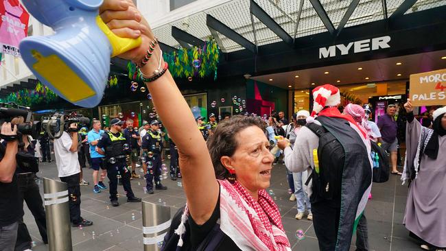 Pro-Palestinian protestors carried banners and shouted slogans. Picture: NewsWire / Luis Enrique Ascui