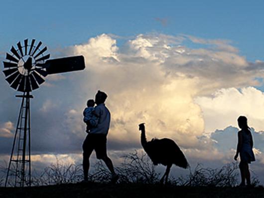 LONGREACH, AUSTRALIA - MARCH 18: Nic Walker holds his son Tasman as he walks with Carley Walker and 'Stan' the emu at their property 'Rio Station' on March 18, 2014 in Longreach, Australia. Queensland, AustraliaÃ•s second-largest state, is currently suffering from its widest spread drought on record. Almost 80% of the region is now declared affected. The Australian government recently approved an emergency drought relief package of A$320m, of which at least A$280m is allocated for loans to assist eligible farm businesses to recover. (Photo by Lisa Maree Williams/Getty Images) *** Local Caption *** Nic Walker; Saxony Walker TWAM 140607